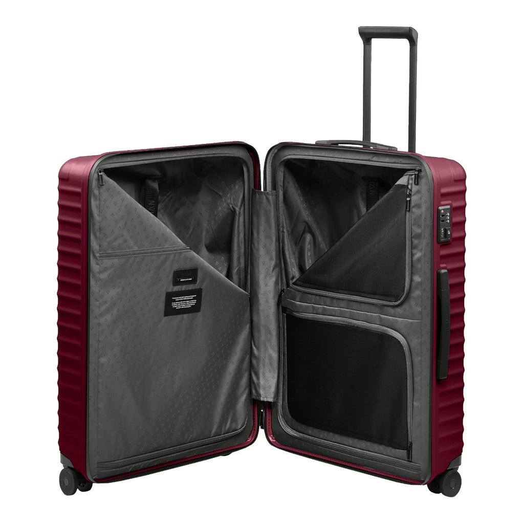 Lieblingstasche UPGRADE 4w Trolley L in burgundy with open interior featuring zippered mesh compartments and lining.
