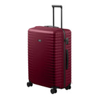 Lieblingstasche UPGRADE 4w Trolley L in dark red with a ribbed hard shell, telescopic handle, and four spinner wheels.