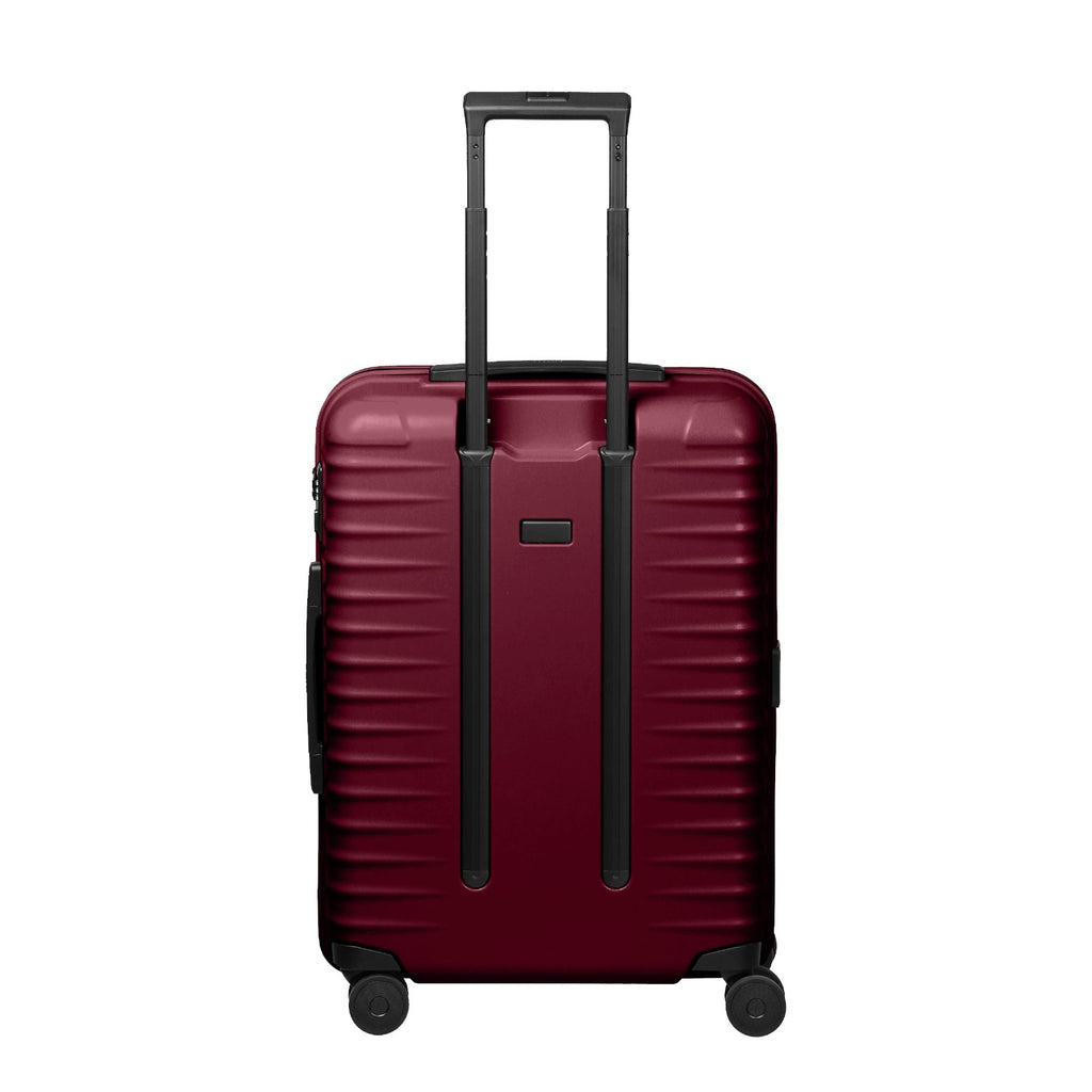 Lieblingstasche UPGRADE 4w Trolley M in dark red with a hard shell, telescopic handle, and four spinner wheels.