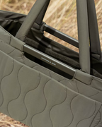 Lieblingstasche Vaasa quilted shopping basket in olive green with padded handles and Kapten & Son branding