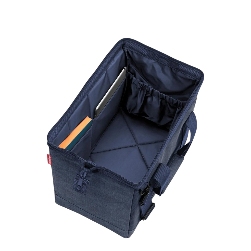 Lieblingstasche Allrounder M travel bag in navy blue with an open top, internal pockets, and sturdy fabric design.