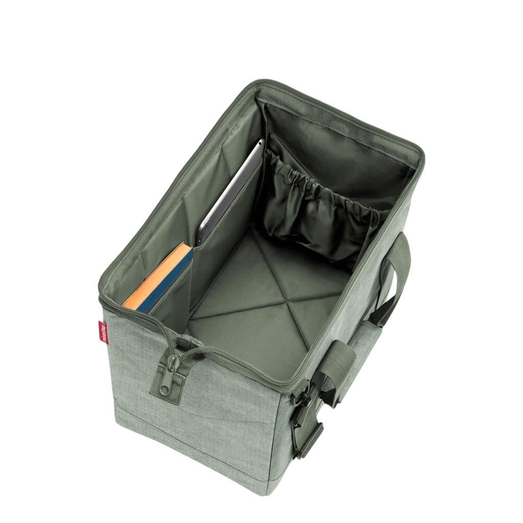 Lieblingstasche Allrounder M travel bag in olive green polyester with open interior, side pockets, and metal frame.