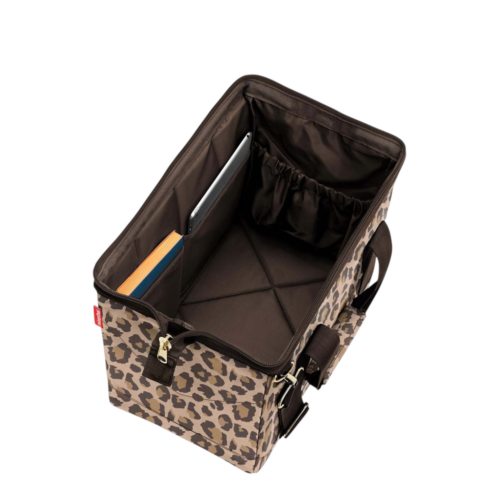 Lieblingstasche Allrounder M travel bag in leopard print with open top, internal pockets, and sturdy metal frame.